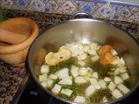 paloma torcaz con arroz y en su salsa